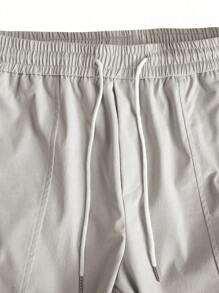 HUEFORM Men's Loose Solid Color Drawstring Waist Pocketed Cargo Pants - Beige - View 3