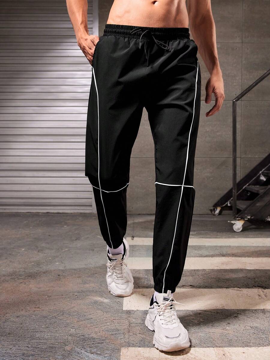 Manfinity Sport Corelite Nam Sọc Giải trí Quần - màu đen - Xem 1