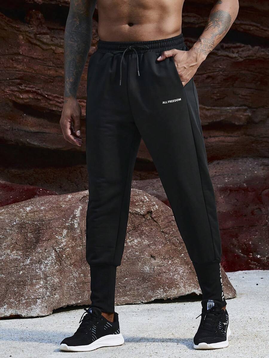 Manfinity Sport Corelite Men's Letter Printed Drawstring Waist Sports Pants Sweat Pants - Black - View 1