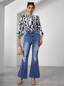 SHEIN Essnce Jeans Svasati Da Donna Con Fori Effetto Consumato