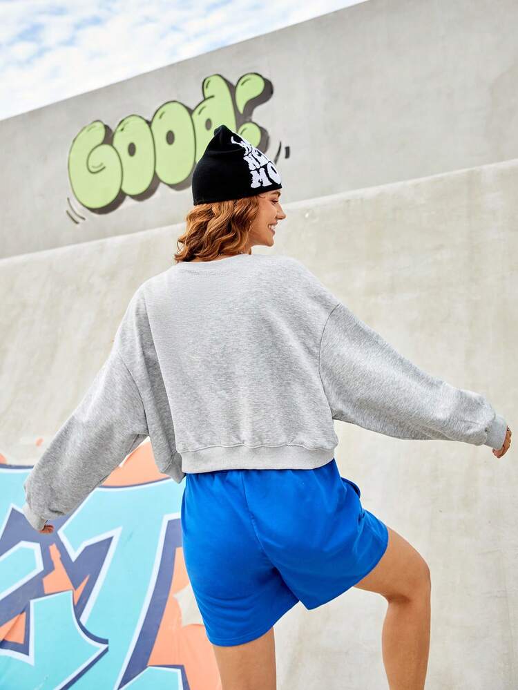 Women'S Drop Shoulder Sports Sweatshirt With Printed Slogan And Smiling Face