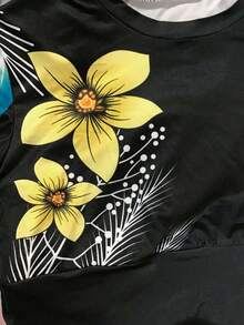 LovelyWholesale Conjunto pantalones con top de manga con volante con estampado floral - Negro - Ver 8