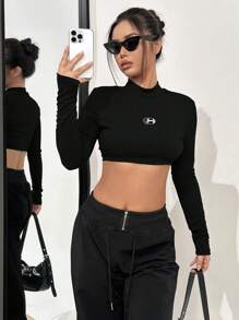 SHEIN Unity Top corto de manga larga con cuello medio alto para mujer, ropa de otoño - Negro - Ver 4