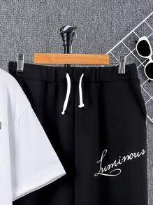 SHEIN Conjunto De Blusa Casual Solta De Manga Curta E Calças Compridas Para Meninos Adolescentes Com Padrão De Letras Em Inglês