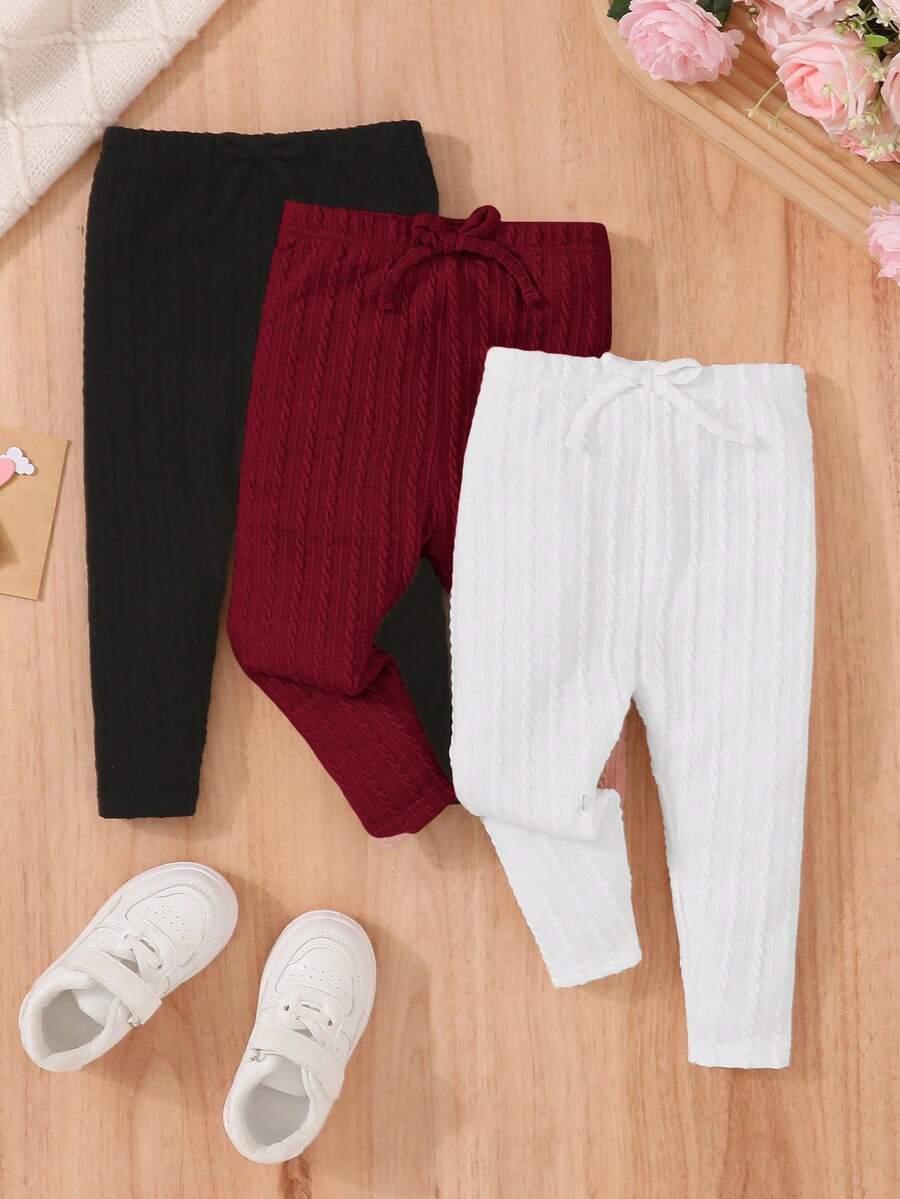 SHEIN 3 chiếc quần dệt kim màu trơn thông thường dành cho trẻ sơ sinh có eo co giãn - Màu Đỏ Sâu - Xem 1