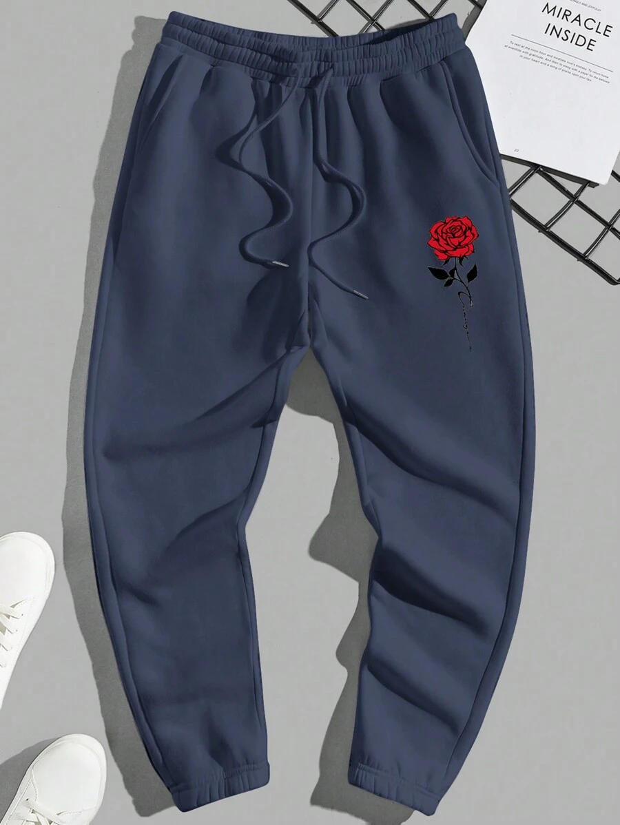 RueChic Men's Floral Print Drawstring Joggers With Elasticized Cuffs - Navy Blue - View 1