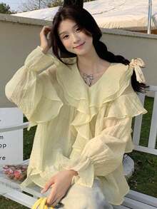 泡泡長袖襯衫,帶有襯褶v領