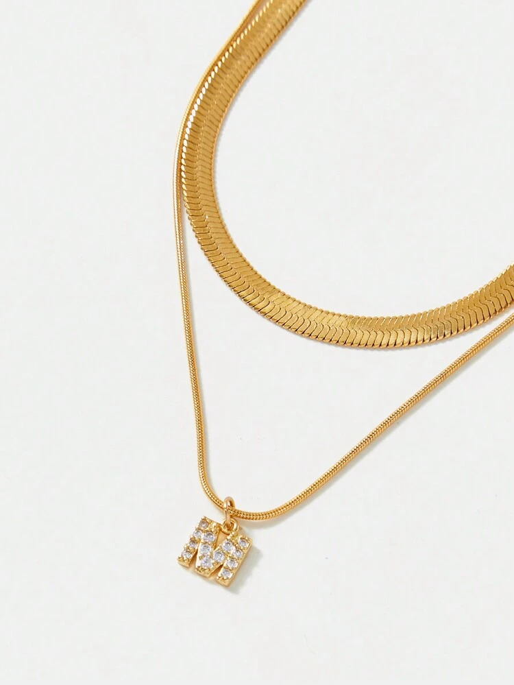 Conjunto De Collar De Cadena De Hueso Plano Con Microincrustaciones De Circonita Cúbica Y Letra M Chapada En Oro