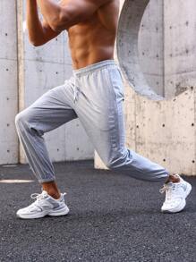 Manfinity Sport Streetwear Męski Spodnie sportowe Ze sznurkiem do ściągania Talia I Przekątna Kieszenie