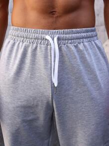 Manfinity Sport Streetwear Męski Spodnie sportowe Ze sznurkiem do ściągania Talia I Przekątna Kieszenie