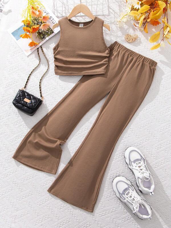 SHEIN Conjunto De Top Sin Mangas Plisado De Cuello Redondo Y Pantalones De Punto De Color Sólido Para Niñas Jóvenes
