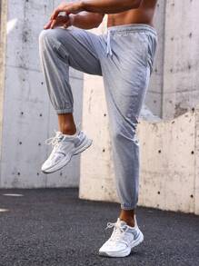 Manfinity Sport Streetwear Męski Spodnie sportowe Ze sznurkiem do ściągania Talia I Przekątna Kieszenie