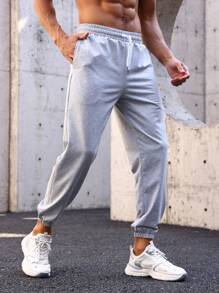 Manfinity Sport Streetwear Męski Spodnie sportowe Ze sznurkiem do ściągania Talia I Przekątna Kieszenie