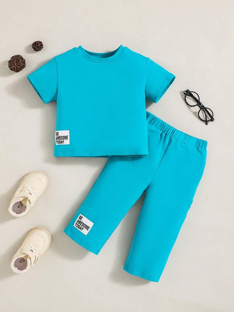 Baby Boys' Solid Color Short Sleeve T-Shirt With Striped Detail And Elastic Waistband Pants Set
