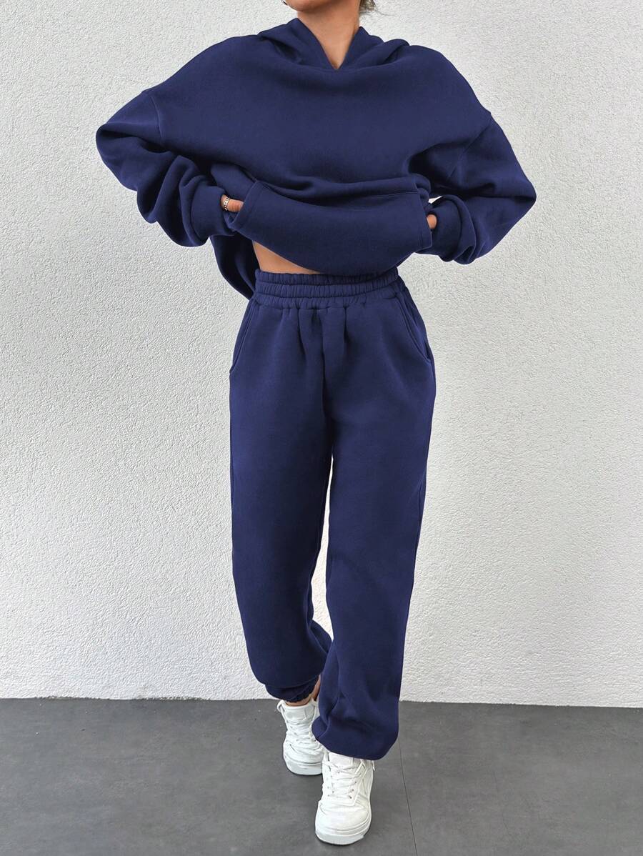 EURMUSE Conjunto de dos piezas con sudadera con capucha y pantalón de chándal de hombros caídos con bolsillo canguro - Azul Marino - Ver 1
