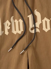 Manfinity Homme Loose-Fit Men's Shorts With Letter Print And Drawstring Waist