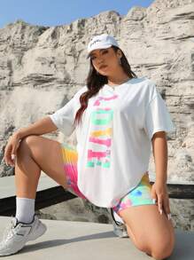 SHEIN EZwear 大码女式彩色印花宽松针织 T 恤，圆领垂肩，适合夏季、秋季、返校、户外活动、室内休闲和日常穿着。可享 2 件套折扣，搭配彩色高腰骑行裤作为下装。情人节