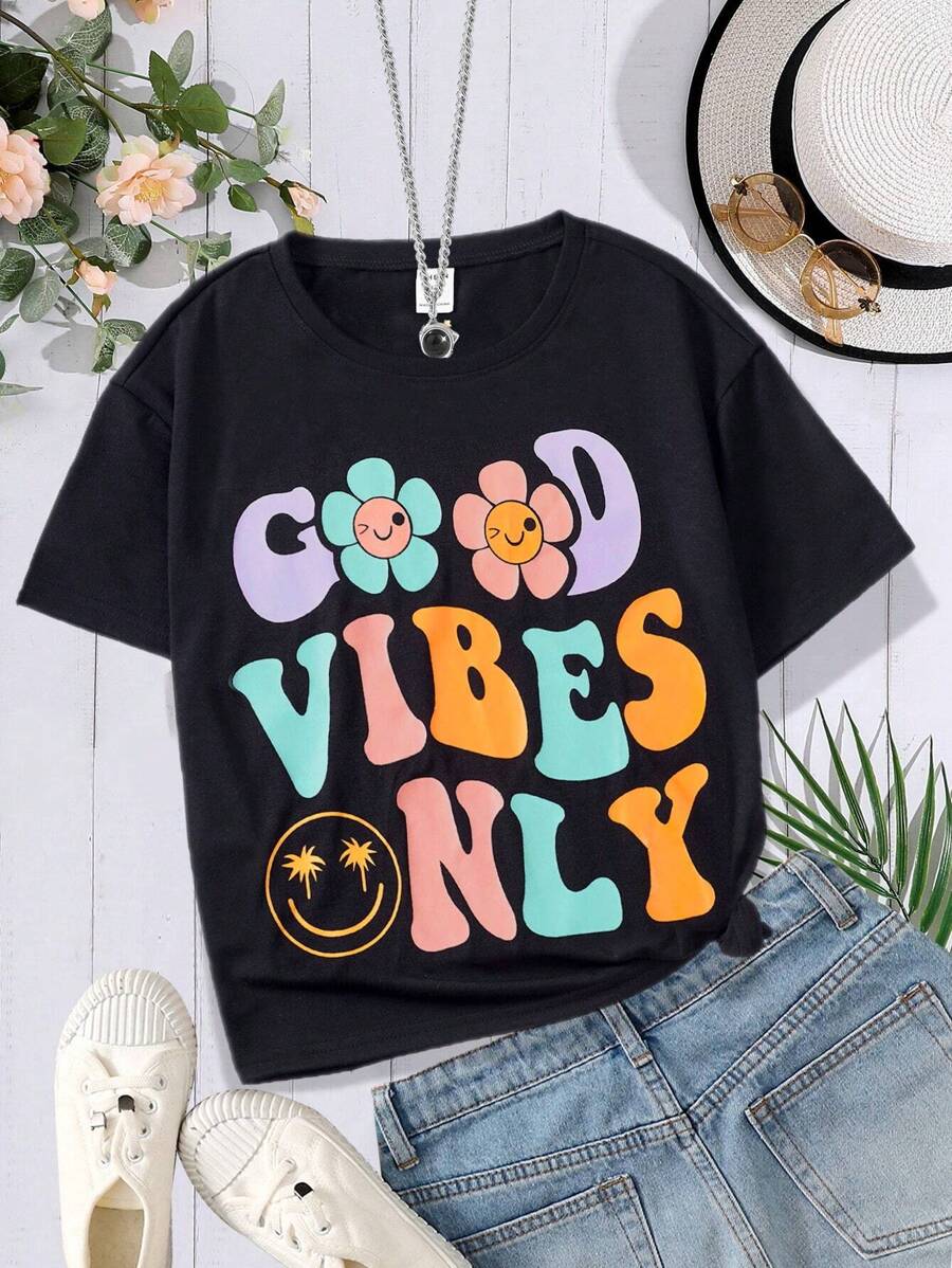 Camiseta gráfica con flores y lema para niñas preadolescentes - Negro - Ver 1