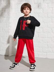 SHEIN 2 piezas Conjunto informal y cómodo para niño joven con sudadera de cuello redondo con estampado de letras y pantalón de felpa liso y acolchado - Multicolor - Ver 6