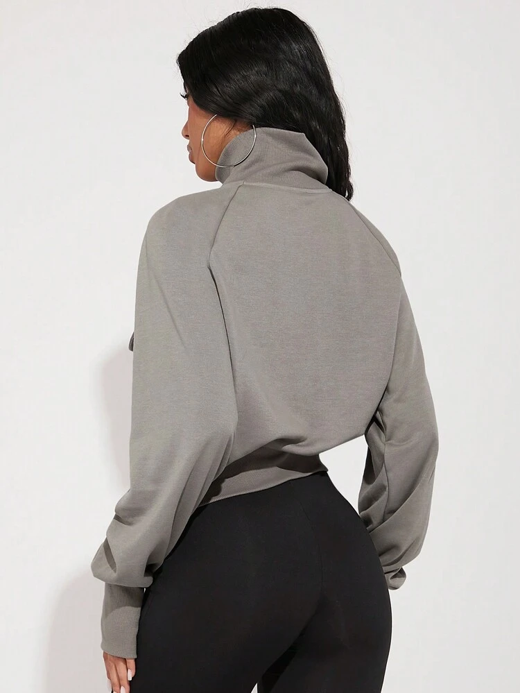 Half Zip Raglan Thumb Hole Sweatshirt
