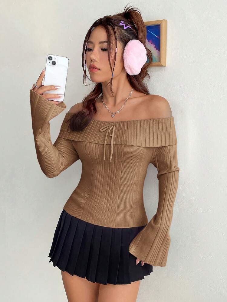 Open Shoulder Knit Sweater With Tie Detail And Flare Sleeves