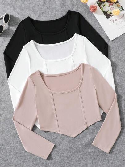SHEIN Sparklyn Tween Girl 3 件套纯色长袖 T 恤套装包含简约设计的长袖 T 恤，适合日常穿着。纯色和经典款式使其成为基本搭配单品。长袖设计适合春秋穿着，不仅温暖而且舒适。这套服装百搭，可以自由搭配，让 Tween Girls 在不同场合展现不同风格。整体风格时尚简约，适合 Tween Girls 展现青春活力和时尚品味。