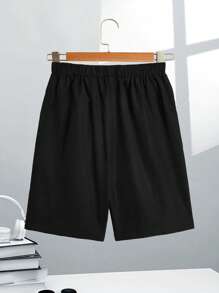 SHEIN Pantalones Cortos Tejidos Sueltos De Color Sólido Casuales Para Niños