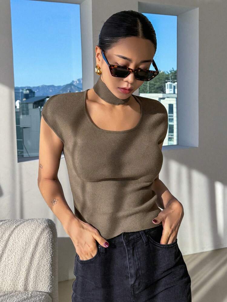 Women'S Solid Color Hollow Out Knit Sweater With Stand Collar