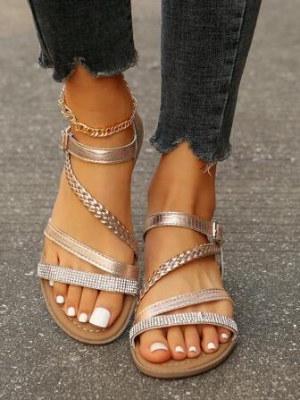 Sandalias planas para señoras de talla grande con estampado de piel de serpiente tejido para uso en exteriores