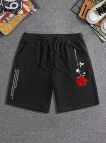Manfinity Roghcode Pantalones cortos con cordón de cintura con estampado floral y eslogan para hombres, pantalones cortos de sudadera con cordón de moda para salir, regalo para esposo o novio - Negro - Ver 1