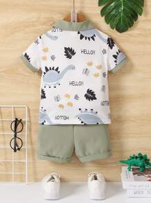 Polo A Righe Con Stampa Di Dinosauro E Pantaloni Corti Per Bimbi Alla Moda, Adatti Ai Mesi Estivi