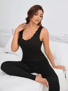 قميص نسائي دافئ بحافة منحنية