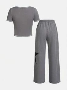SHEIN Juego De Dos Piezas Para Adolescentes, Polera Tejida Con Estampado De Letra Y Pantalones Largos Con Estampado De Estrellas