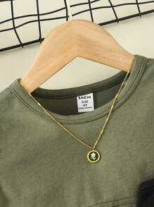 SHEIN Young Girl Letter Print Cami Top Camouflage Skirt & Solid T-Shirt Set