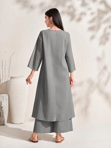 Al Najma Bộ đồ hai mảnh áo cổ tròn viền bất đối xứng và quần ống rộng cho nữ - Xám - Xem 2