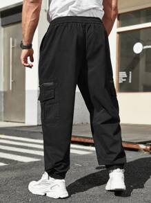 Manfinity LEGND Pantalones De Hombre De Talla Grande Con Puños Elásticos Y Bolsillos Laterales Con Solapa - Negro - Ver 2