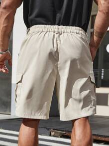 SHEIN Manfinity Homme 男式大尺碼純色翻領口口袋短褲，帶有貨物裝扮的休閒服裝 - 米色 - 查看 2