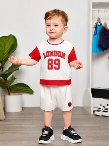 SHEIN Conjunto De Pantalones Cortos Y Top De Manga Corta Con Bloques De Color Deportivo Con Estampado De Letras Para Bebé Niño Y Niño