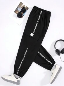 SHEIN Calças Folgadas De Tecido Casual Resort Para Meninos Adolescentes Com Patch De Letras E Bolsos De Patch Tridimensionais.