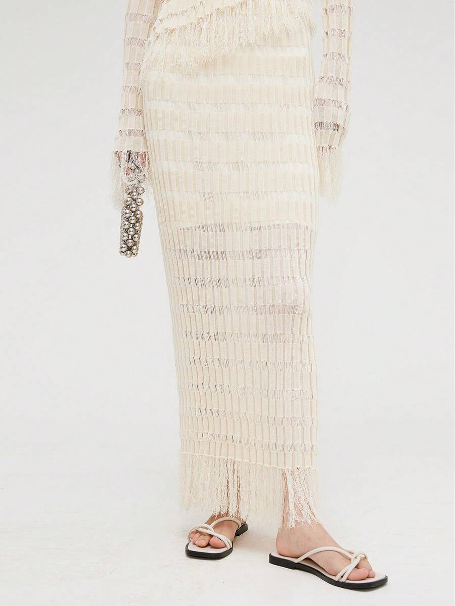 Falda de suéter de punto ajustada de alta gama y diseño único para mujer