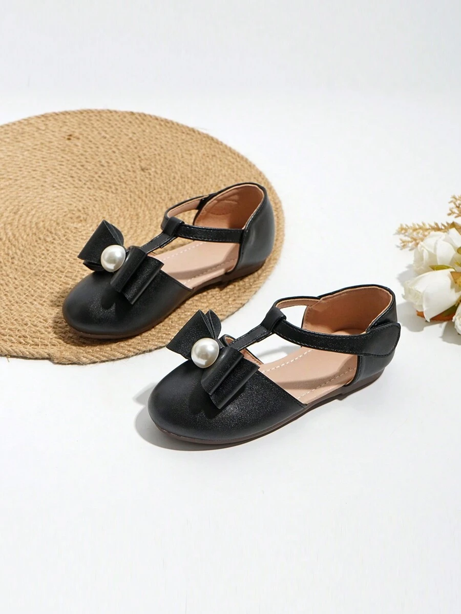 حذاء مسطح أسود للأطفال بتفاصيل لؤلؤ وعقدة