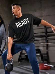 Manfinity Sport Corelite Freund-Stil Herren Sport T-Shirt mit Buchstabendruck Workout Oberteile