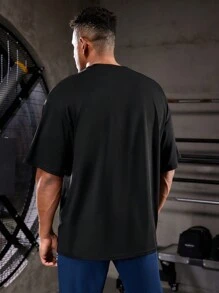 Manfinity Sport Corelite Freund-Stil Herren Sport T-Shirt mit Buchstabendruck Workout Oberteile