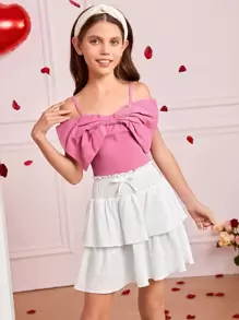 Tween Girls' Woven Solid Color Spaghetti Strap Top With Bowknot Detail And Woven Layered Skirt Set