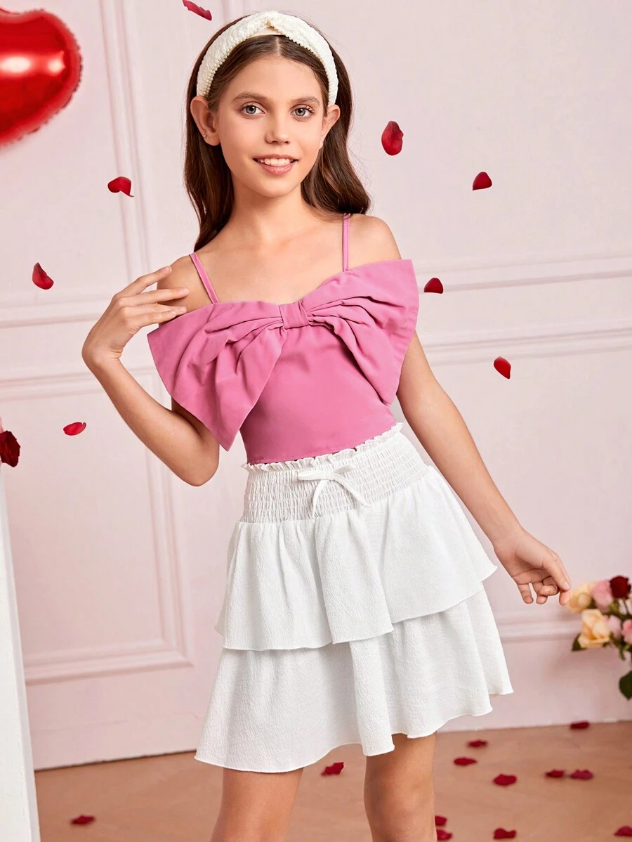 Tween Girls' Woven Solid Color Spaghetti Strap Top With Bowknot Detail And Woven Layered Skirt Set