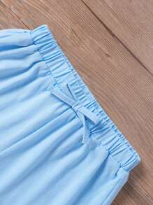 مجموعة 3قطع للفتيات الصغيرات من الخزف الصوفي بلون ثابت، تحتوي على توب خزفي بلا أكمام، شورت فضفاض وقميص شبكي