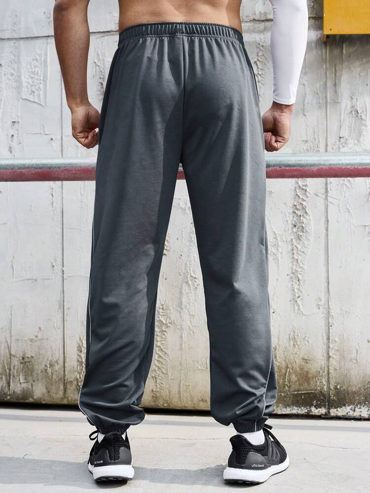 Men's Solid Color Elastic Waist Jogger Pants With Slanted Pockets Sweat Pants