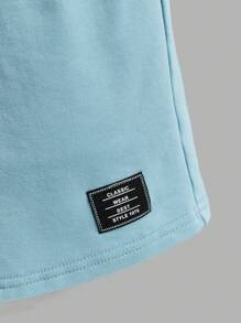 SHEIN Leap Crew Conjunto De 2 Piezas De Camiseta De Manga Corta Con Cuello Redondo Y Pantalones Cortos Con Estampado De Letras Para Niños