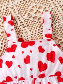 Mono de bebé niña con estampado de corazones y gran decoración de lazo - Rojo - Ver 5