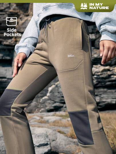 In My Nature 女款戶外運動長褲,彩色拼接設計和字母刺繡